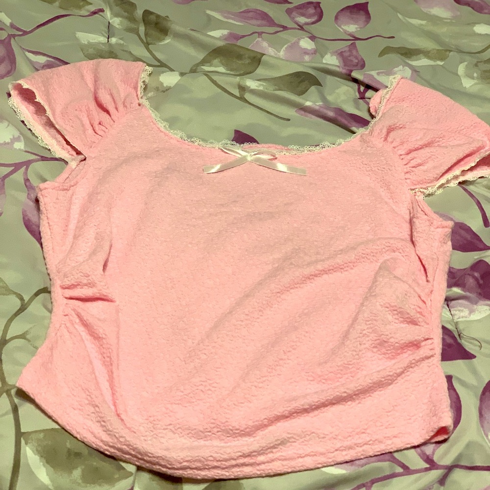 Pink shirt. new. never been worn.
